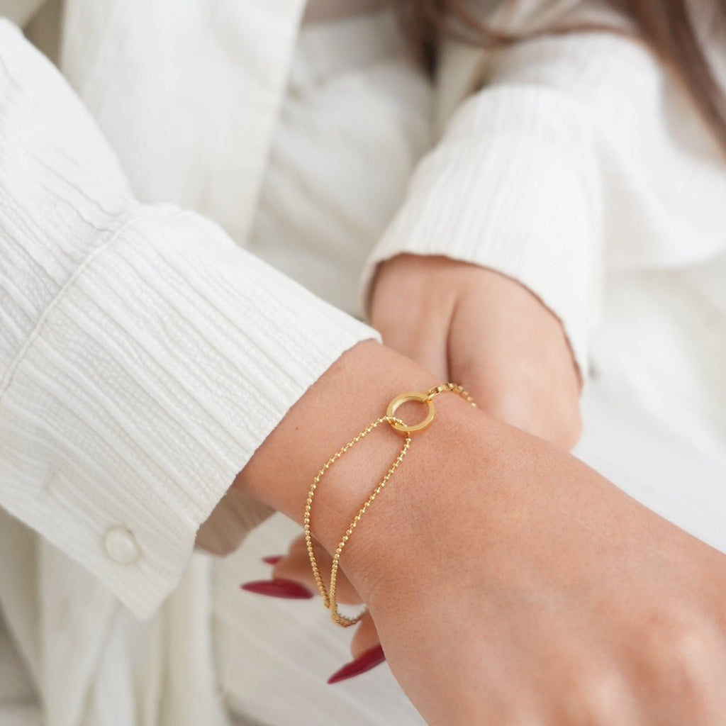 Image of the Divine Harmony Bracelet – an elegant 18K gold stainless steel bracelet symbolizing balance, grace, and timeless beauty.