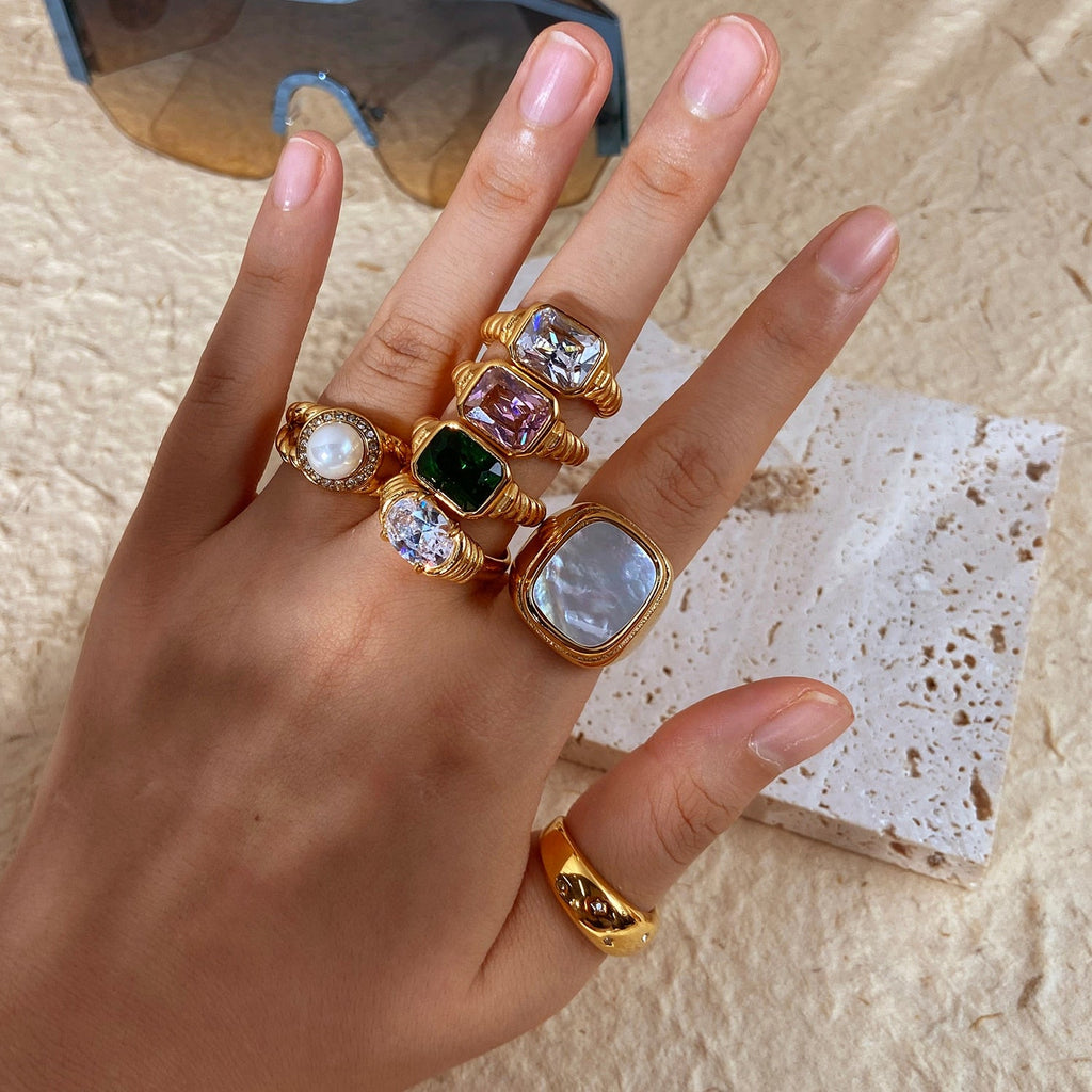 Image of the Cleo Ring – a striking 18K gold stainless steel ring with a bold, regal-inspired design, perfect for elevating any look.

