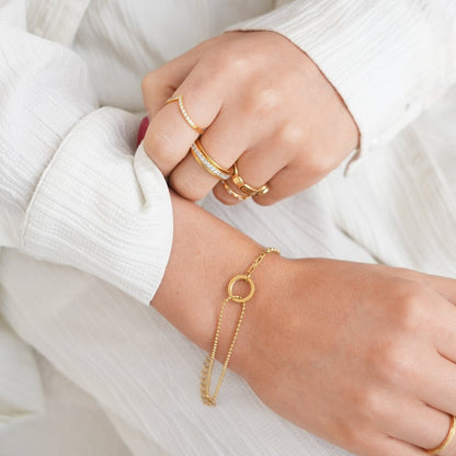 Image of the Divine Harmony Bracelet – an elegant 18K gold stainless steel bracelet symbolizing balance, grace, and timeless beauty.

