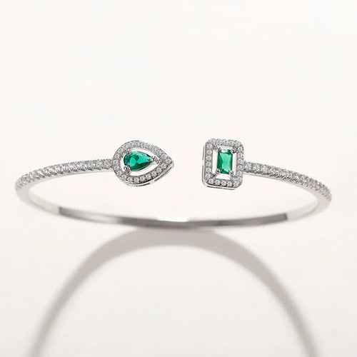 Image of the Eternity Cuff – a bold and elegant 18K gold stainless steel cuff bracelet, perfect for layering or wearing solo.

