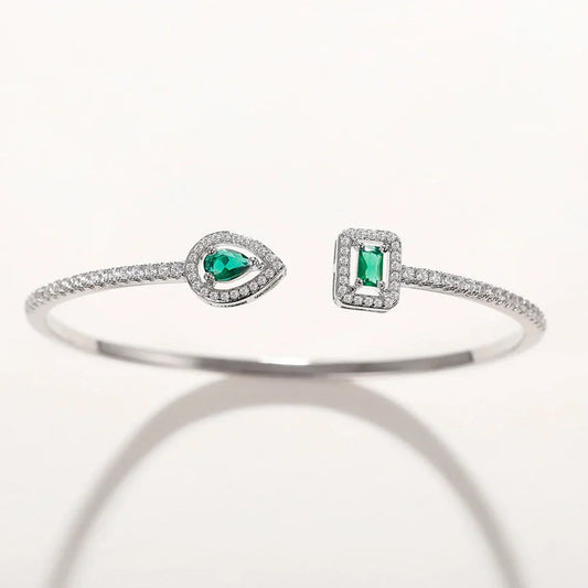 Image of the Eternity Cuff – a bold and elegant 18K gold stainless steel cuff bracelet, perfect for layering or wearing solo.

