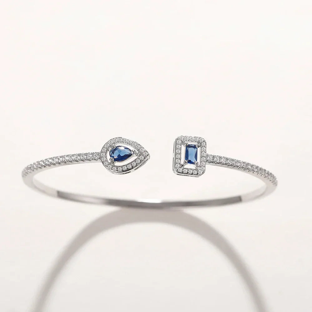 Image of the Eternity Cuff – a bold and elegant 18K gold stainless steel cuff bracelet, perfect for layering or wearing solo.

