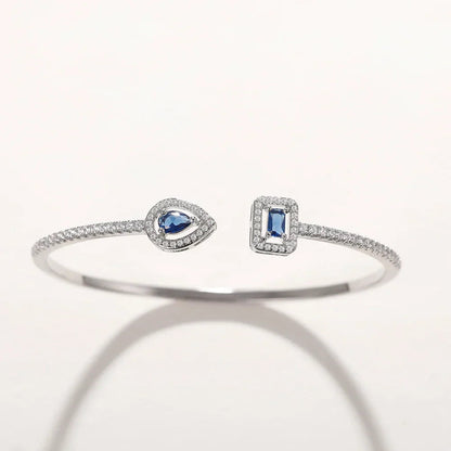 Image of the Eternity Cuff – a bold and elegant 18K gold stainless steel cuff bracelet, perfect for layering or wearing solo.

