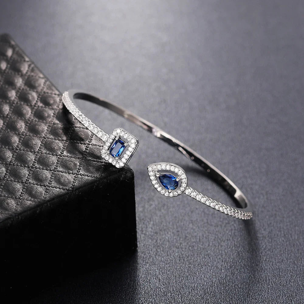 Image of the Eternity Cuff – a bold and elegant 18K gold stainless steel cuff bracelet, perfect for layering or wearing solo.

