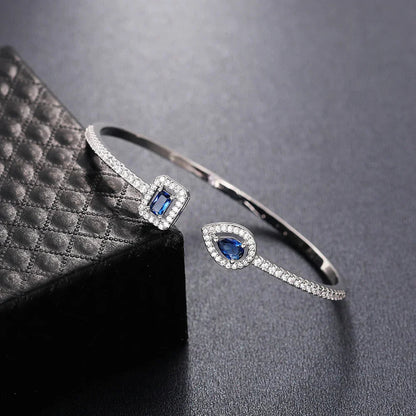 Image of the Eternity Cuff – a bold and elegant 18K gold stainless steel cuff bracelet, perfect for layering or wearing solo.

