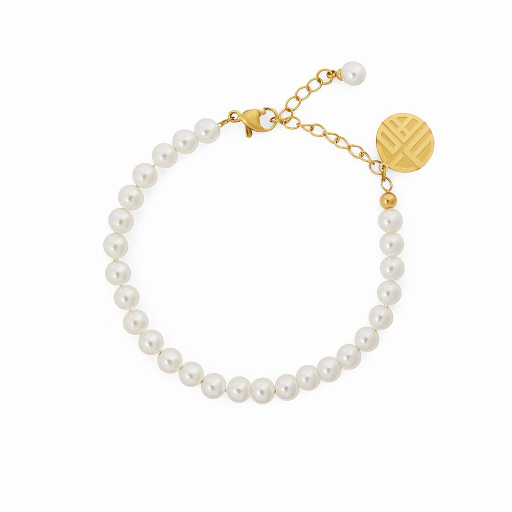 Image of the Golden Grace Bracelet – an elegant 18K gold stainless steel bracelet with a smooth, radiant finish for timeless sophistication.

