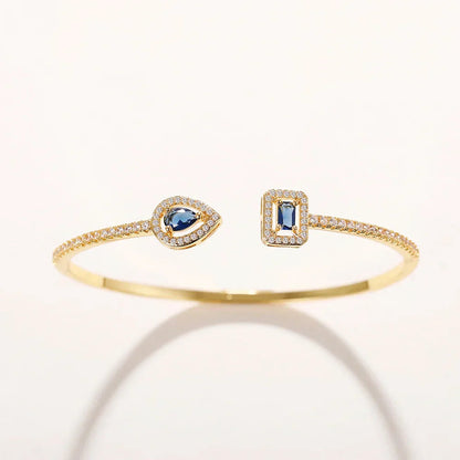 Image of the Graceful Elegance Bracelet – a refined 18K gold stainless steel bracelet with timeless, elegant design for day or night wear.

