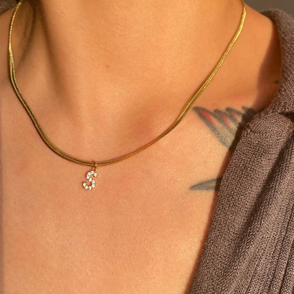 Herringbone Initial Necklace with a stylish chain and personalized initial pendant.

