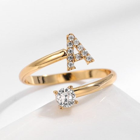 Image of the Initial Ring – a personalized ring featuring a single letter, ideal for adding a unique and elegant touch to any look.

