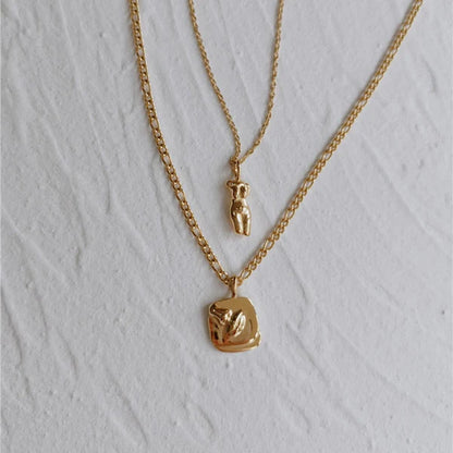 La Femme Necklace – elegant, feminine jewelry piece perfect for a refined, modern look.

