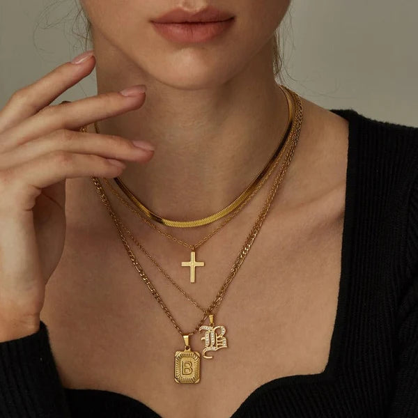 Leila Square Letter Pendant Necklace with a minimalist design and engraved initial.

