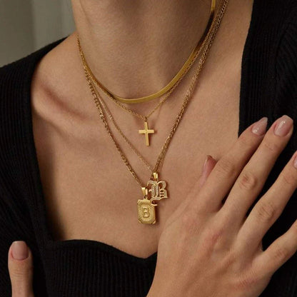 Leila Square Letter Pendant Necklace with a minimalist design and engraved initial.

