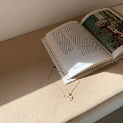 Luna Opal Necklace featuring an iridescent opal stone with a soft, celestial glow.

