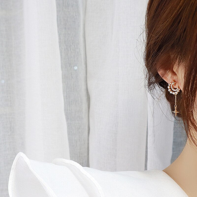 Moonlight Earrings with an elegant and radiant design, adding sophistication and charm to your look for any occasion.