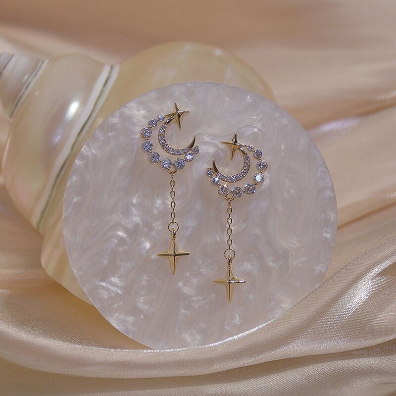 Moonlight Earrings with an elegant and radiant design, adding sophistication and charm to your look for any occasion.