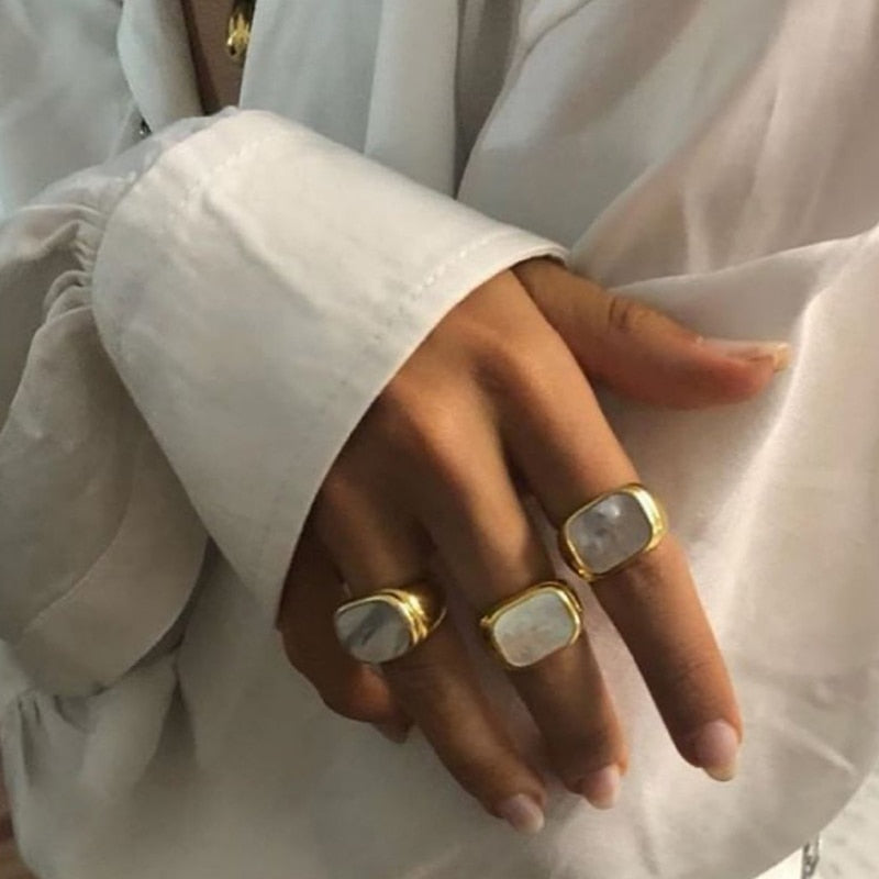 Image of the Opal Ring – a delicate 18K gold stainless steel ring with a luminous opal stone, perfect for adding elegance to any look.

