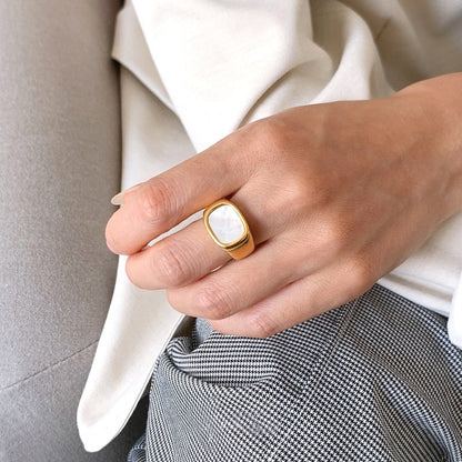 Image of the Opal Ring – a delicate 18K gold stainless steel ring with a luminous opal stone, perfect for adding elegance to any look.

