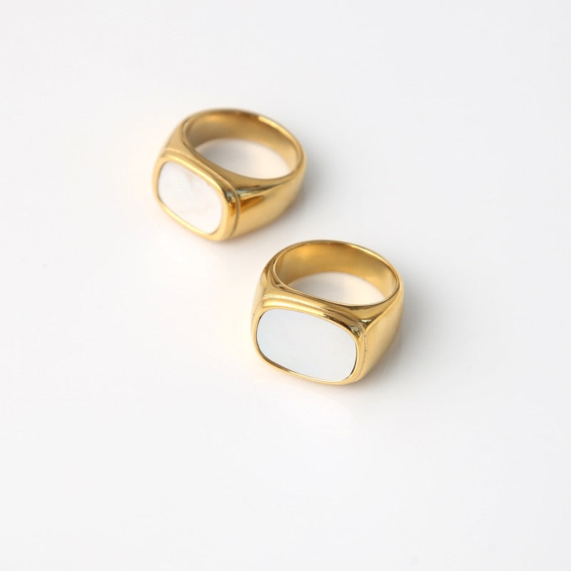 Image of the Opal Ring – a delicate 18K gold stainless steel ring with a luminous opal stone, perfect for adding elegance to any look.

