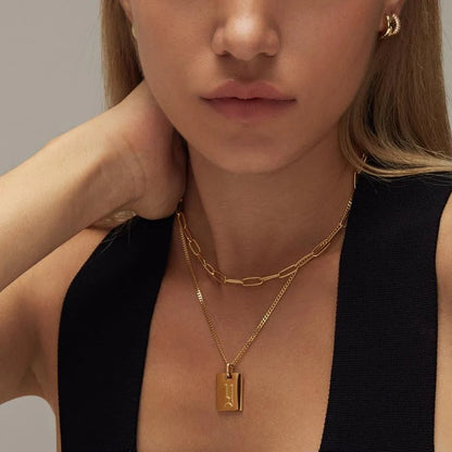 Rope Link Necklace with a classic twisted chain design, ideal for layering or wearing alone.

