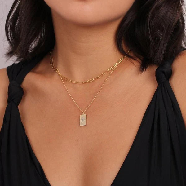 Rope Link Necklace with a classic twisted chain design, ideal for layering or wearing alone.

