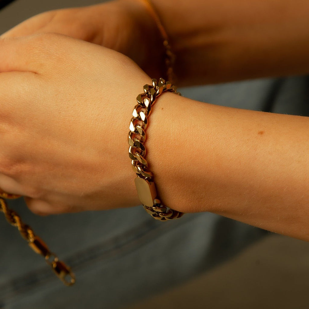 Image of the Starlight Glow Bracelet – a delicate 18K gold stainless steel bracelet with starry accents, inspired by starlit elegance.

