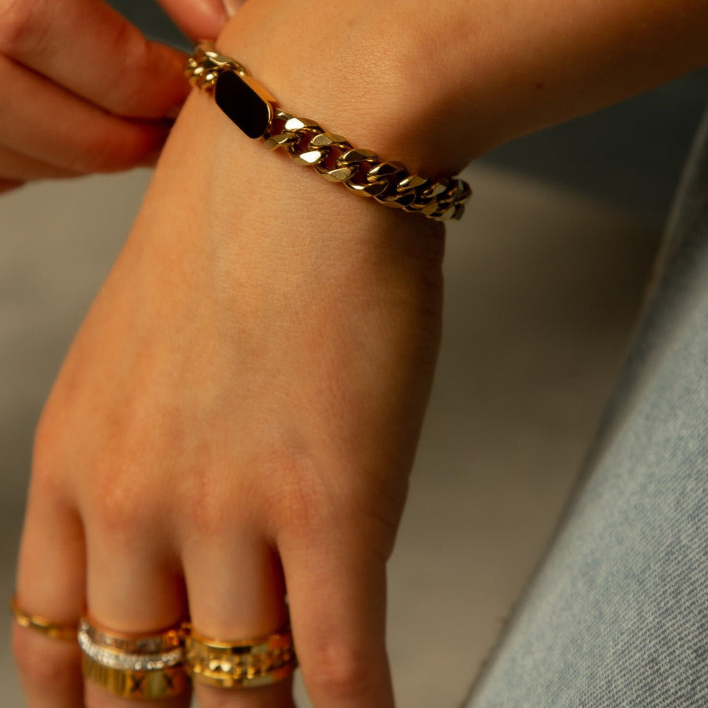 Image of the Starlight Glow Bracelet – a delicate 18K gold stainless steel bracelet with starry accents, inspired by starlit elegance.

