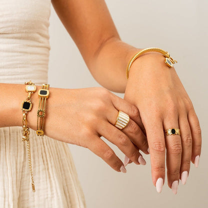 Image of the Velvet Whisper Bracelet – a refined 18K gold stainless steel bracelet with soft, elegant lines for a graceful everyday look.

