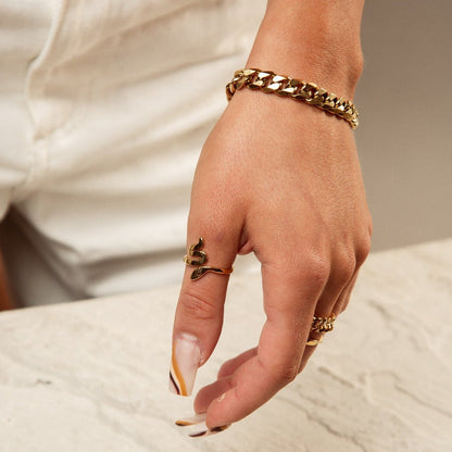 Image of the Vintage Vogue Bracelet – an 18K gold stainless steel bracelet with vintage-inspired details for a chic, timeless fashion statement.

