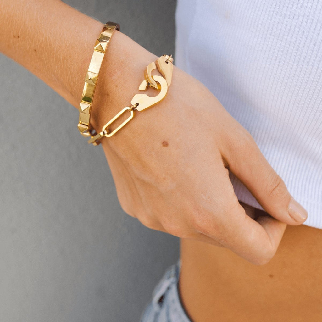 Image of the Whispering Wind Bracelet – a delicate 18K gold stainless steel bracelet inspired by nature’s gentle movement and timeless elegance.

